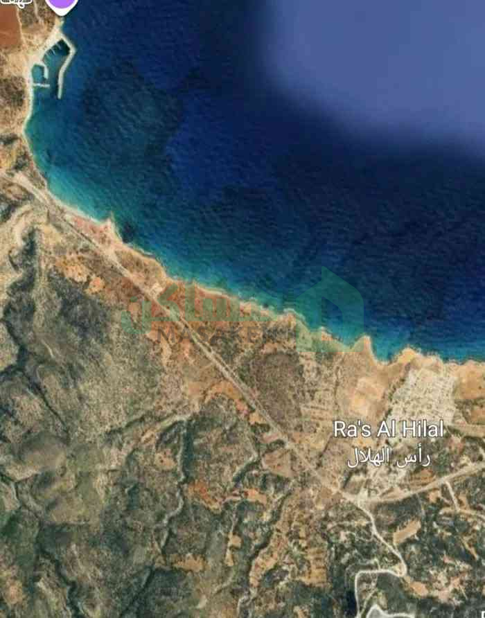 5000 متر علي الطريق الساحلي في منطقة راس
الهلال